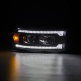 AlphaRex 02-05 Dodge Ram 1500 PRO-Series Projector Headlights Plank Style Black w/Seq Signal